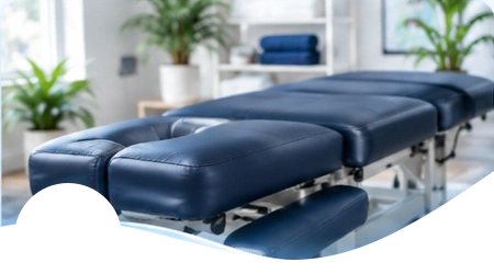 Illustration of a padded chiropractic treatment table.